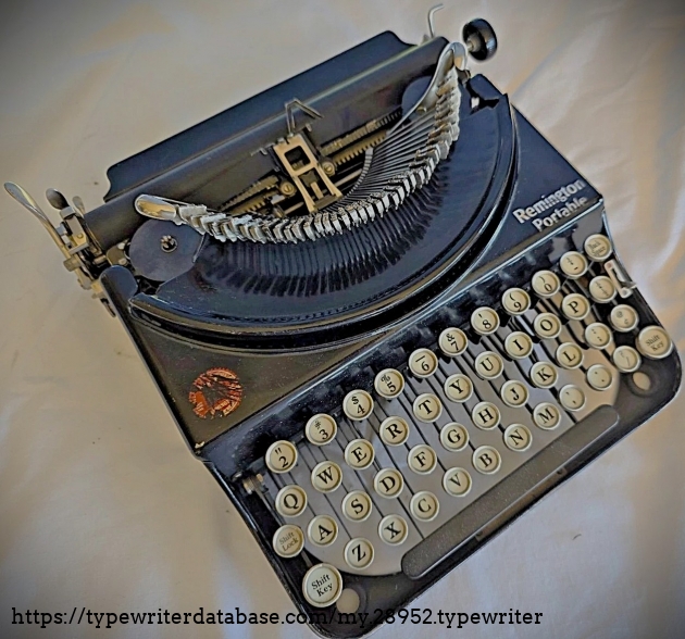 Top-down left-angled view, typebars extended.