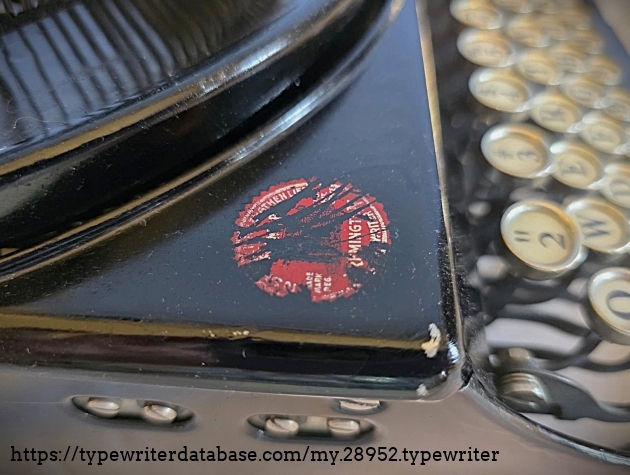 Typewriter decal (scratched out).