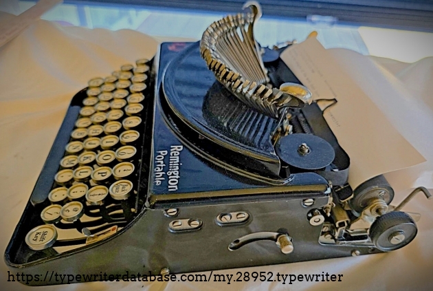 Right broadside, typebars extended.