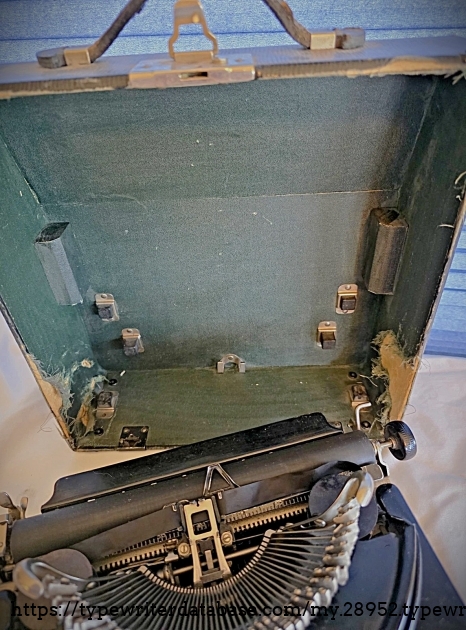 Underside of case lid with typewriter.