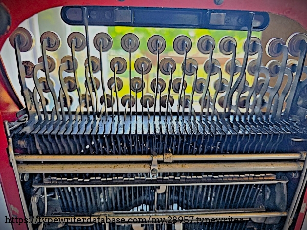 Underside detail - type linkage guide comb.