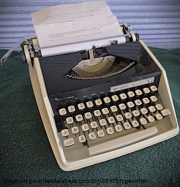 Front left-tilt, typing sample inserted.