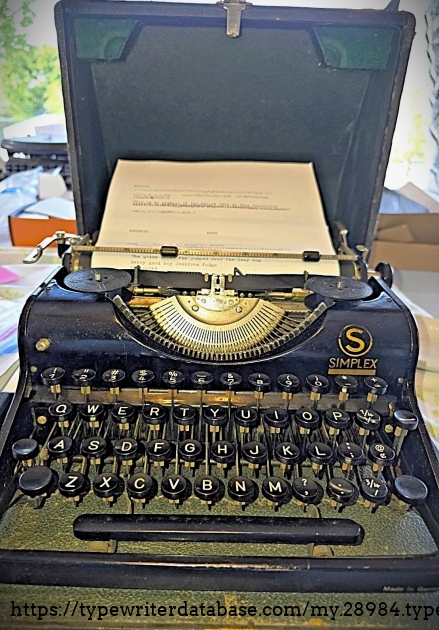 Front main view, in case, with paper inserted.
