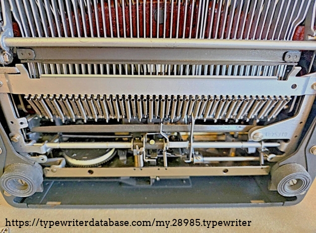 Underside, under the back-end.