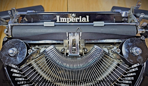 Paper table decal, carriage & type basket.