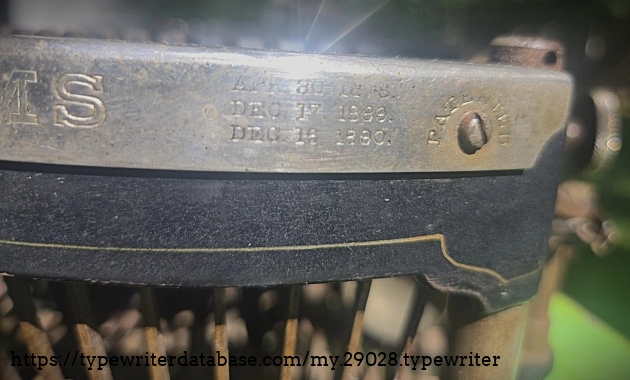 Front nickeled rim, patent dates, right.