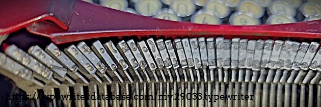 Typebars.  Foundry marks indicate Elite type face.