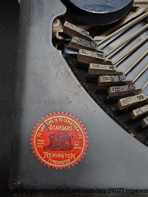 Remington typewriter decal.  The image shows Elite foundry marks.