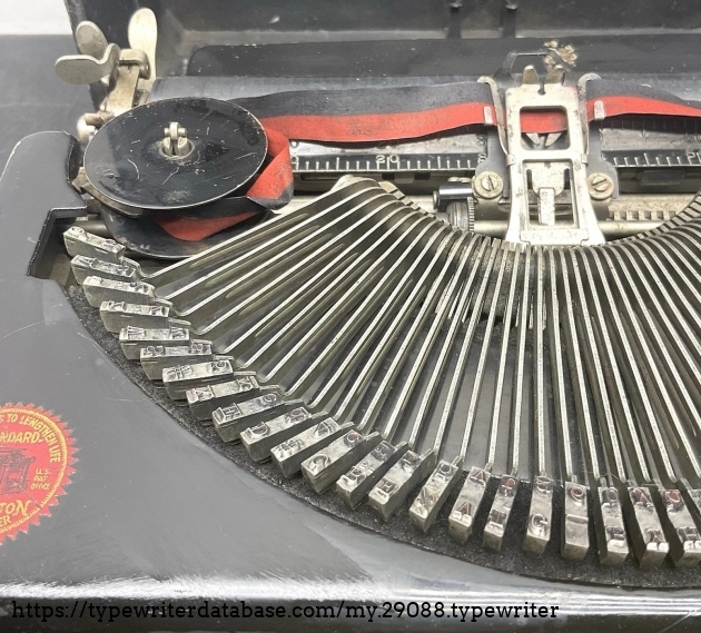 Left top, with partial view of Remington typewriter decal.