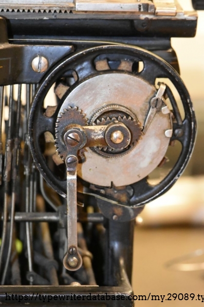 The carriage strap itself appears to be made of spring steel, and the motor is connected to gears to operate the ribbon advance, which also zig-zags laterally.  I'm curious to see how the tri-color variant works - I assume it doesn't zig-zag, and there must be just 3 lanes of colors.