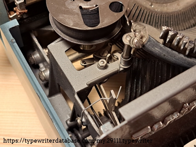 Note: no serial number by the ribbon spool. Frame of machine is cast metal, not stamped.