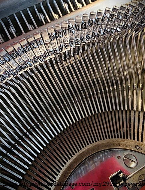 Type basket, showing "93" foundry marks on type slugs.