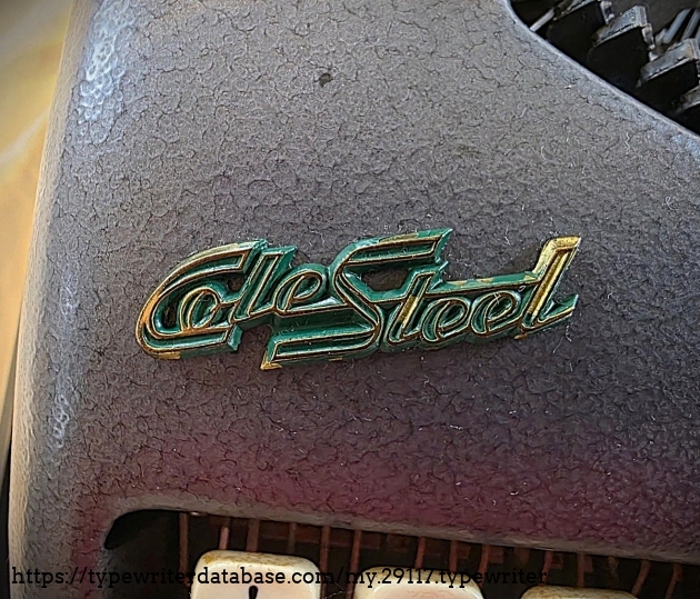 Cole Steel badge on ribbon spool cover.
