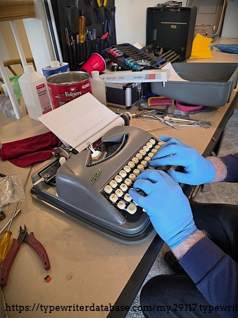 Detail showing good typing form of Dean Meakin.