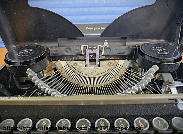 Front close-up, raised cover.