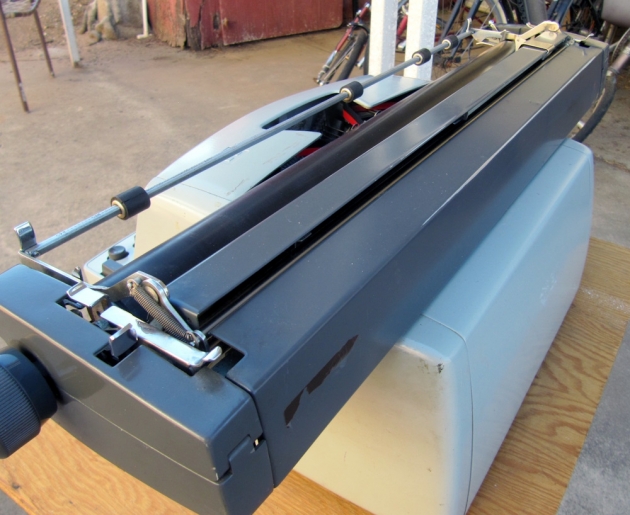 The carriage covers are hinged front and back in two pieces.