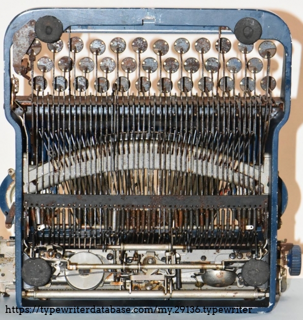 Note some missing springs.  The escapement seems to have escaped from becoming rusted.
