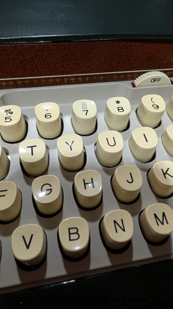 I don't remember having a typewriter with a Check Protector key. It's on the "7" slug.