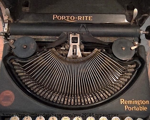 Top view, showing type basket and paper table.  The resolution is poor, but the size of the typeface on the slugs suggests Elite to me.