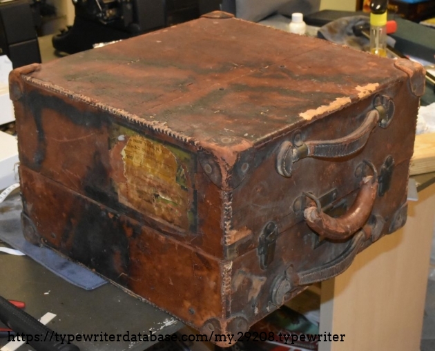 The impressive case.  Sadly, the leather is in poor condition.