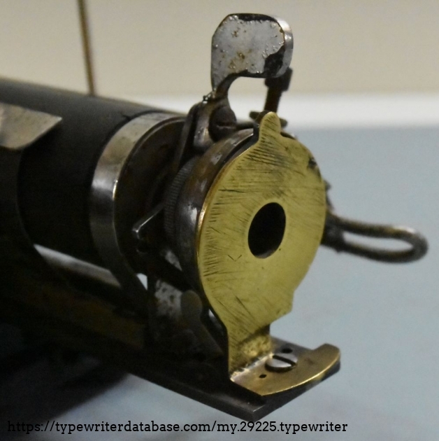 A close up of the bell mute/right slide stop.  The mute doesn't do much to the sound, as the bell has a sad 'click' whether the mute is there or not.