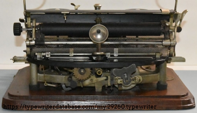 Note the easily tensioned (and over-tensioned) spring motor.