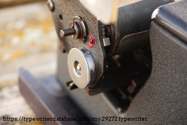 Line spacing adjustment know. Interesting construction compared to usual levers.