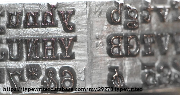 #25, which is Large Roman for the Universal keyboard.  There's a 7 at the bottom, I believe it's just a mold number, and not the ID# for the typeshuttle.  Unlike later ones, the number is backwards - it would have read correctly on the mold.