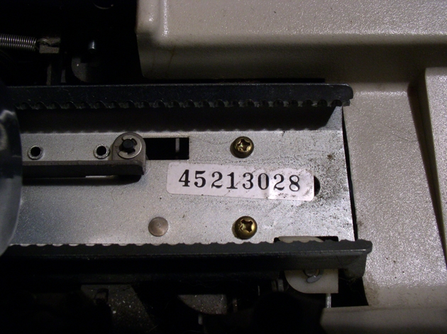 cheap, easily-removable sticker for the serial number