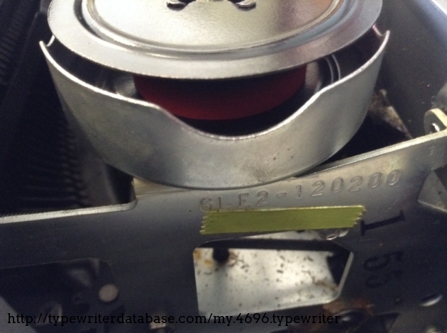 Serial number on right side below ribbon spool