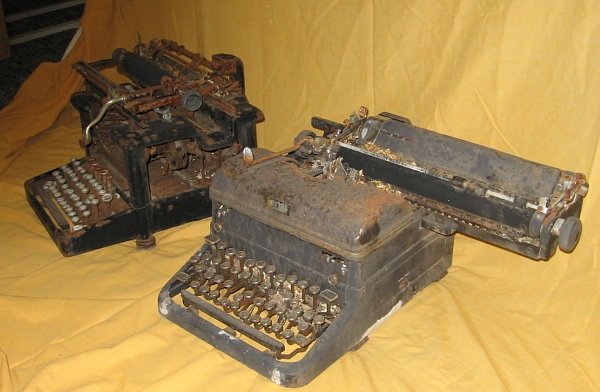 Bought for $10 along with a rusted Remington. Who knows if either one will ever move again? Yeah, that's leaf debris you see nestled in the platen and keyboard.