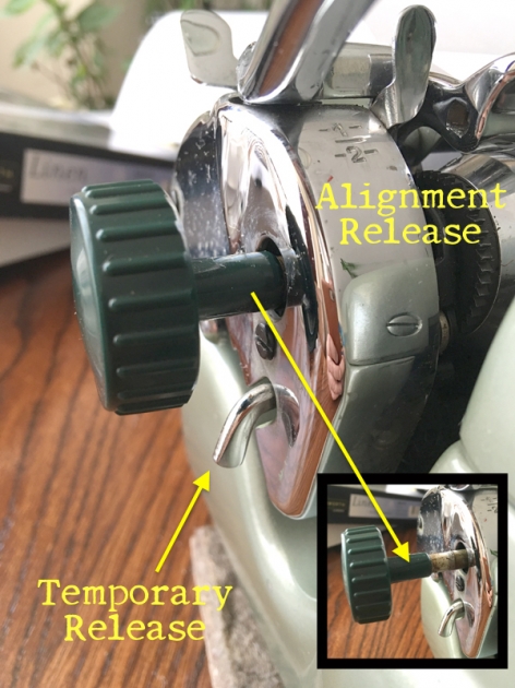 Note the extra lever beneath the platen knob that temporarily releases the line advance catch and also that the conventional release to align the page within the typewriter is not a "momentary" control. (See text.)