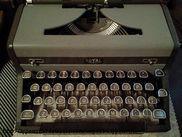 Better view of First Year gravestone keytop design. Still has the metal and plastic, w/inserts composition (BTW, at least from 1938 until the first year solid key design, Royal used a variety of PLASTIC and NOT glass, which is assumed.)