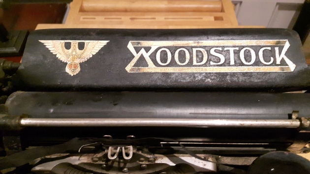 I love the stylized W hidden in the bird (eagle?) and the W and K in the Woodstock logo.