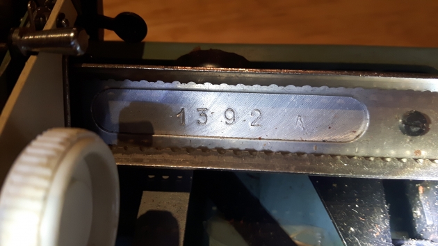 A curiously low serial number, which suggests few were made. The A at the end of the number is about an inch to the right of the rest of the serial number and because of poor etching, hard to read.