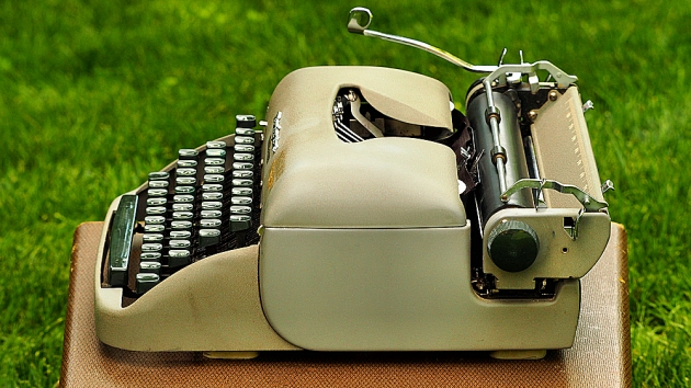 The one surface area of the typewriter that has been cleaned, which demonstrates how dirt can change the perceived colour of model.