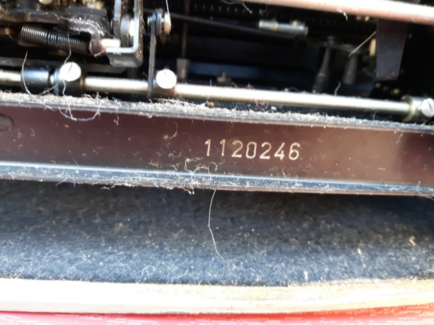 Serial hidden on bottom of machine, which means you have to pop the typewriter off its stubborn base.