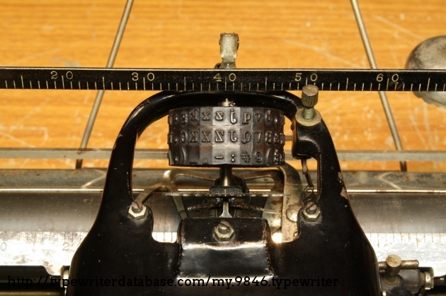 Pressing the CAP button raises the typecylinder up one level so the middle row of characters will strike the platen.