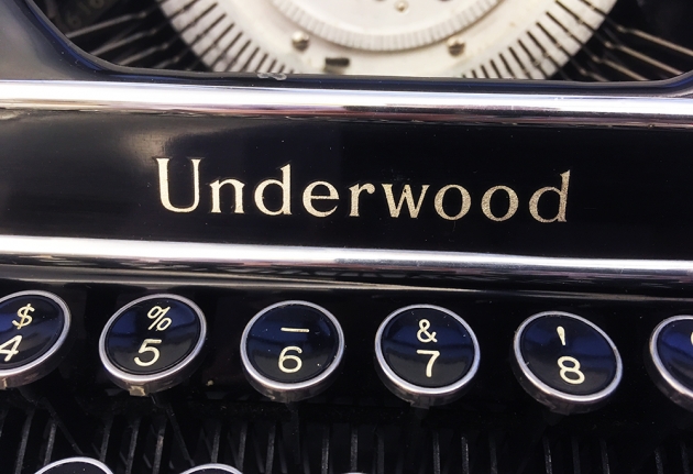Underwood "Champion" logo on top of the keyboard...